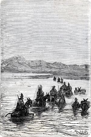 Всадники Черно-белое фото. Всадники переправляются через реку. Рядом идут пару людей, ведущих гружённых ослов.